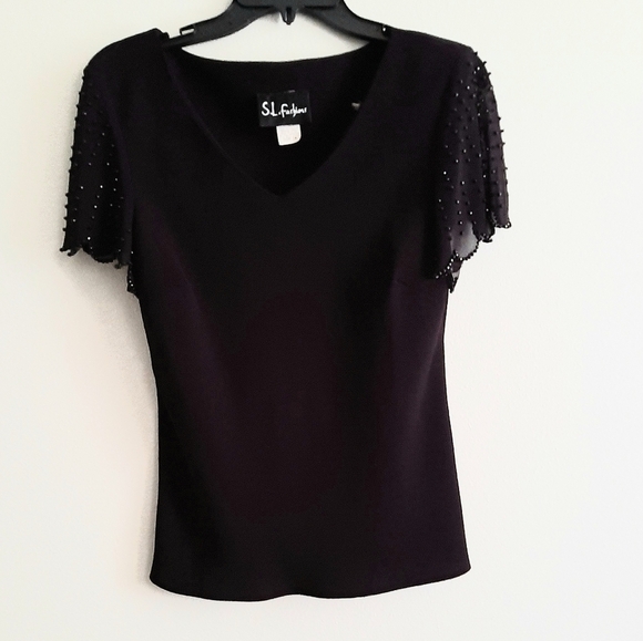 S.L Fashions - Picture 1 of 2